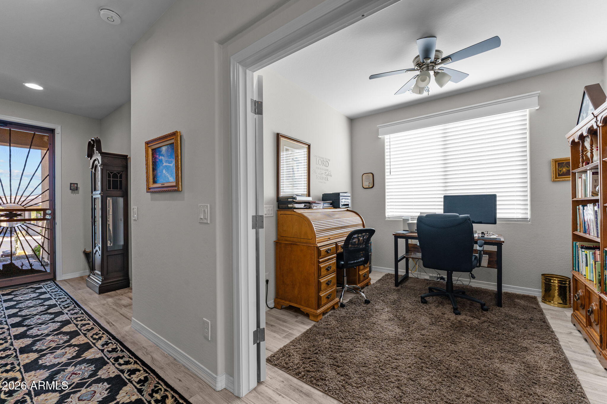 4320 Buffalo Ridge Wickenburg, AZ 85390 - Photo 19 of 57 a view of a workspace with furniture and a window