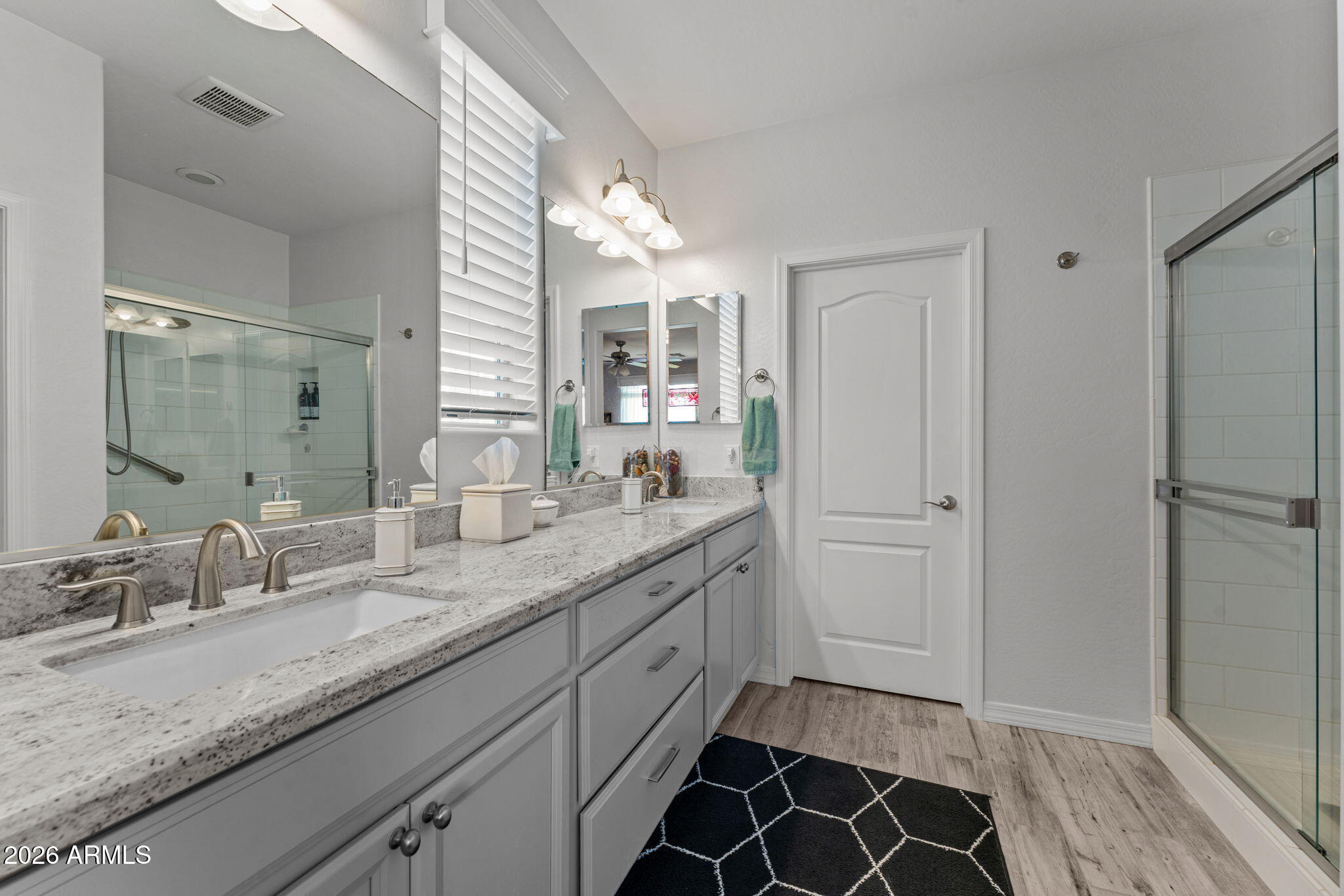4320 Buffalo Ridge Wickenburg, AZ 85390 - Photo 23 of 57 a bathroom with a granite countertop sink and a mirror