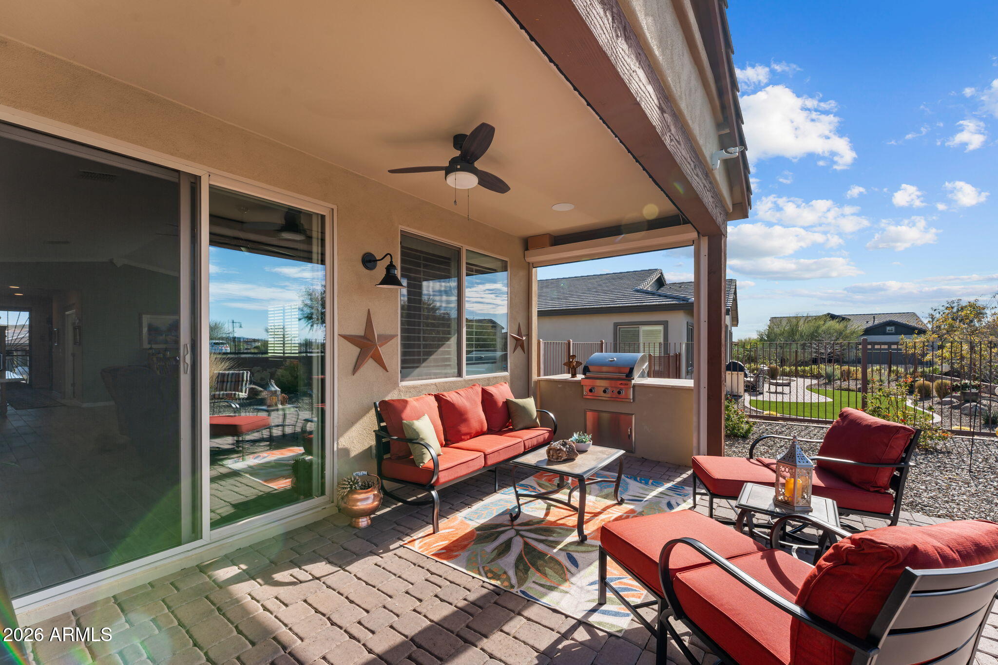 4320 Buffalo Ridge Wickenburg, AZ 85390 - Photo 29 of 57 a outdoor space with patio the couches and a dining table with garden view