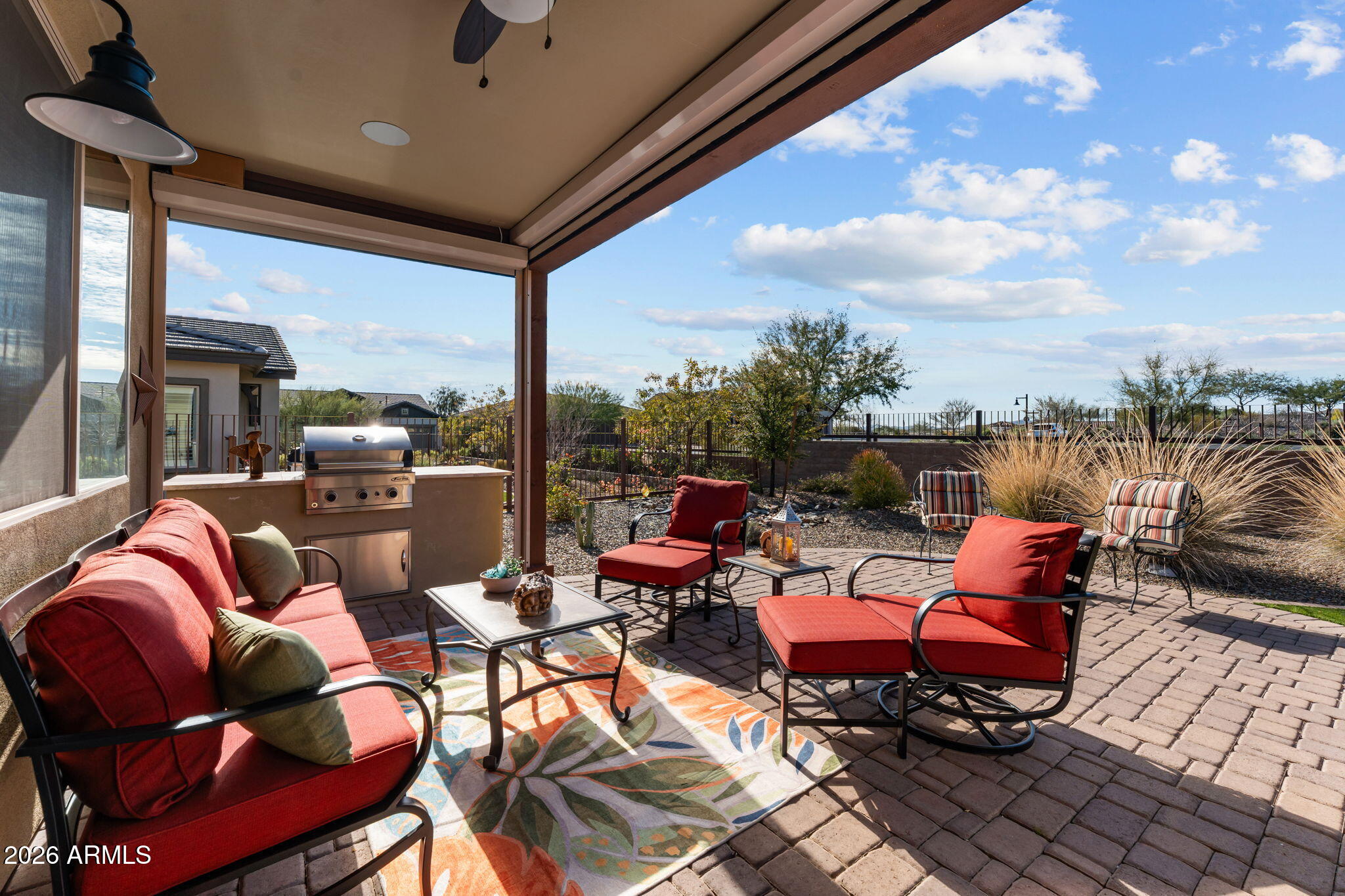 4320 Buffalo Ridge Wickenburg, AZ 85390 - Photo 4 of 57 a outdoor space with patio the couches and a potted plant