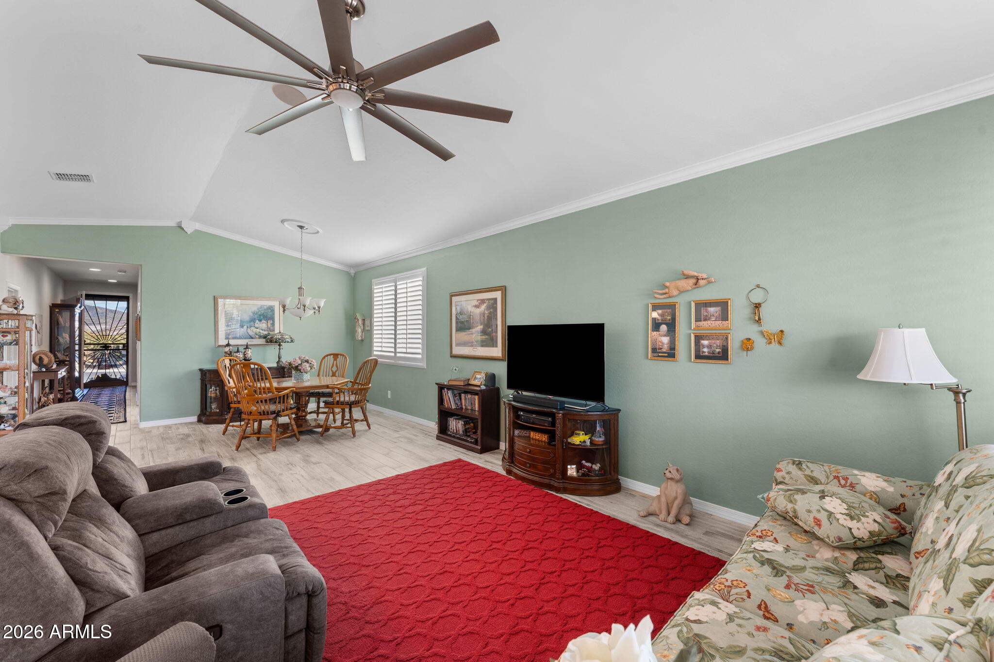 4320 Buffalo Ridge Wickenburg, AZ 85390 - Photo 5 of 57 a bedroom with furniture and a flat screen tv