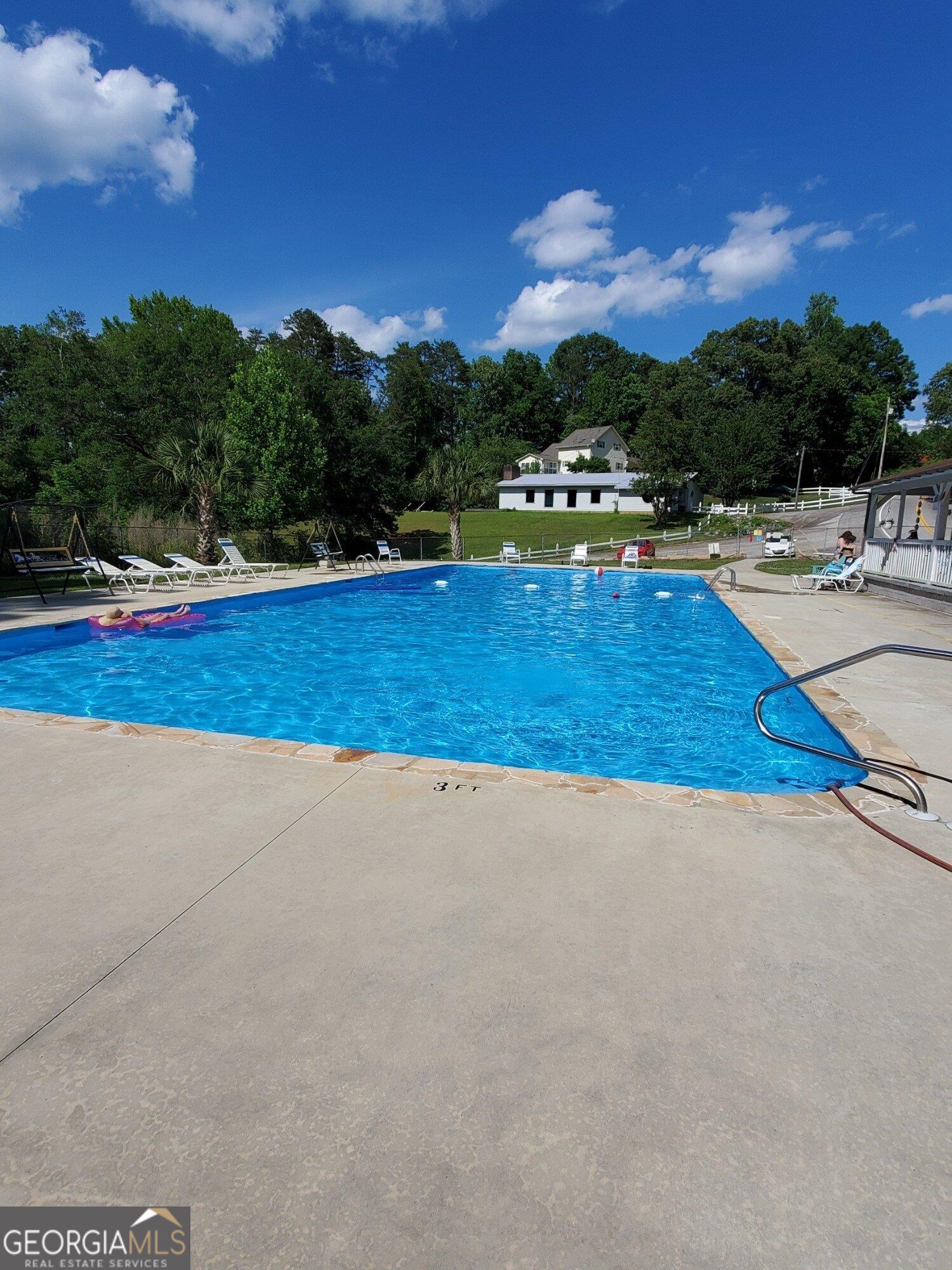 286 Country Club Drive Toccoa, GA 30577 - Photo 3 of 5 a view of swimming pool with a yard