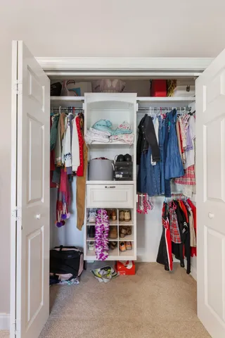 a view of a house with a yard and garage