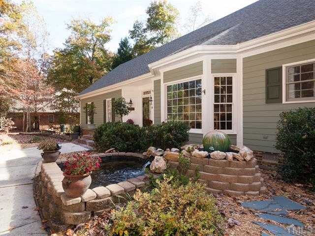 1929 Partridge Berry Drive Raleigh, NC 27606 - Photo 2 of 25 Enjoy the sounds of trickling water as you approach the front door. Exterior Front