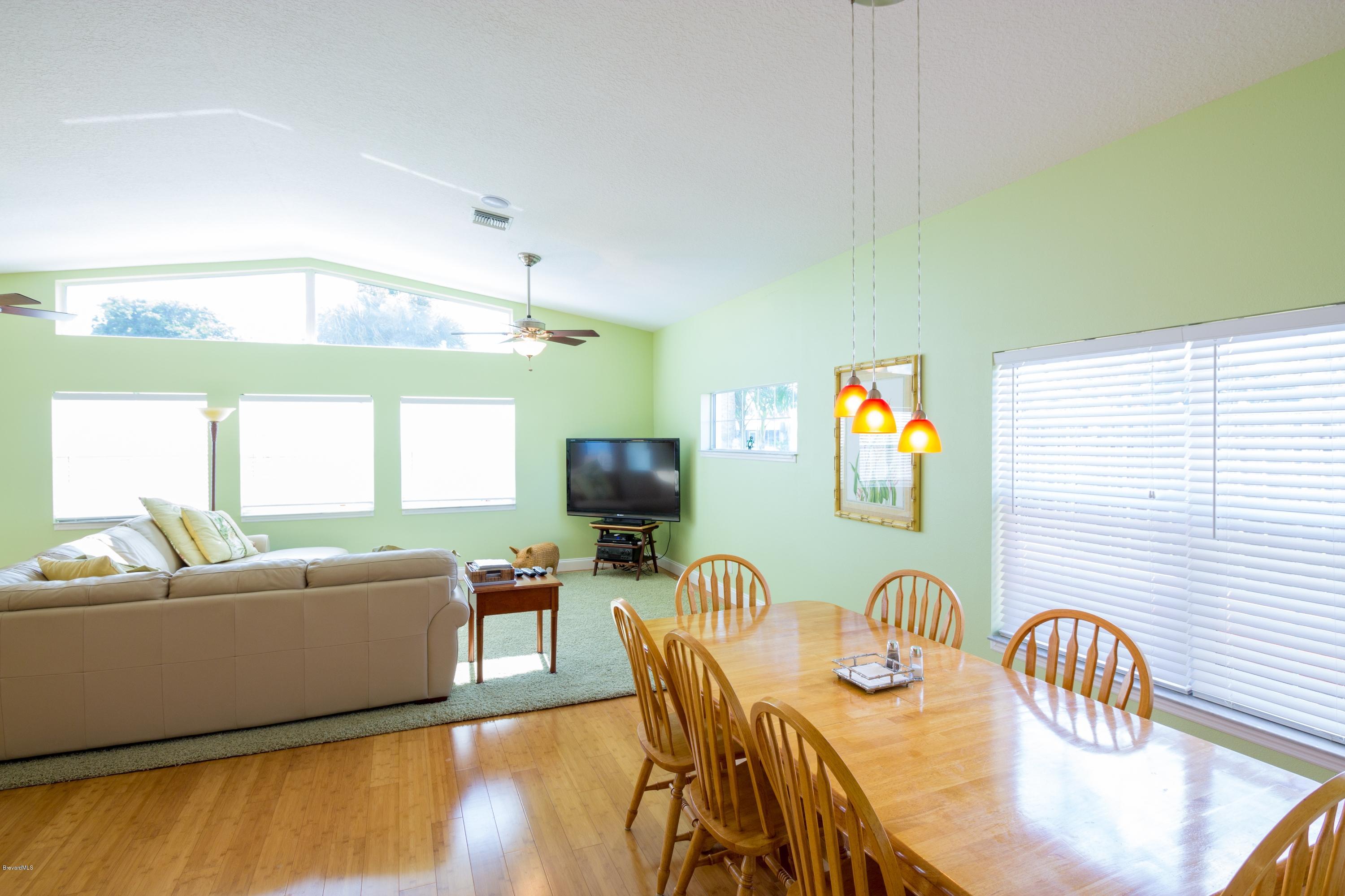 114 Aucila Road Cocoa Beach, FL 32931 - Photo 11 of 34 Dining Room/ Family Room