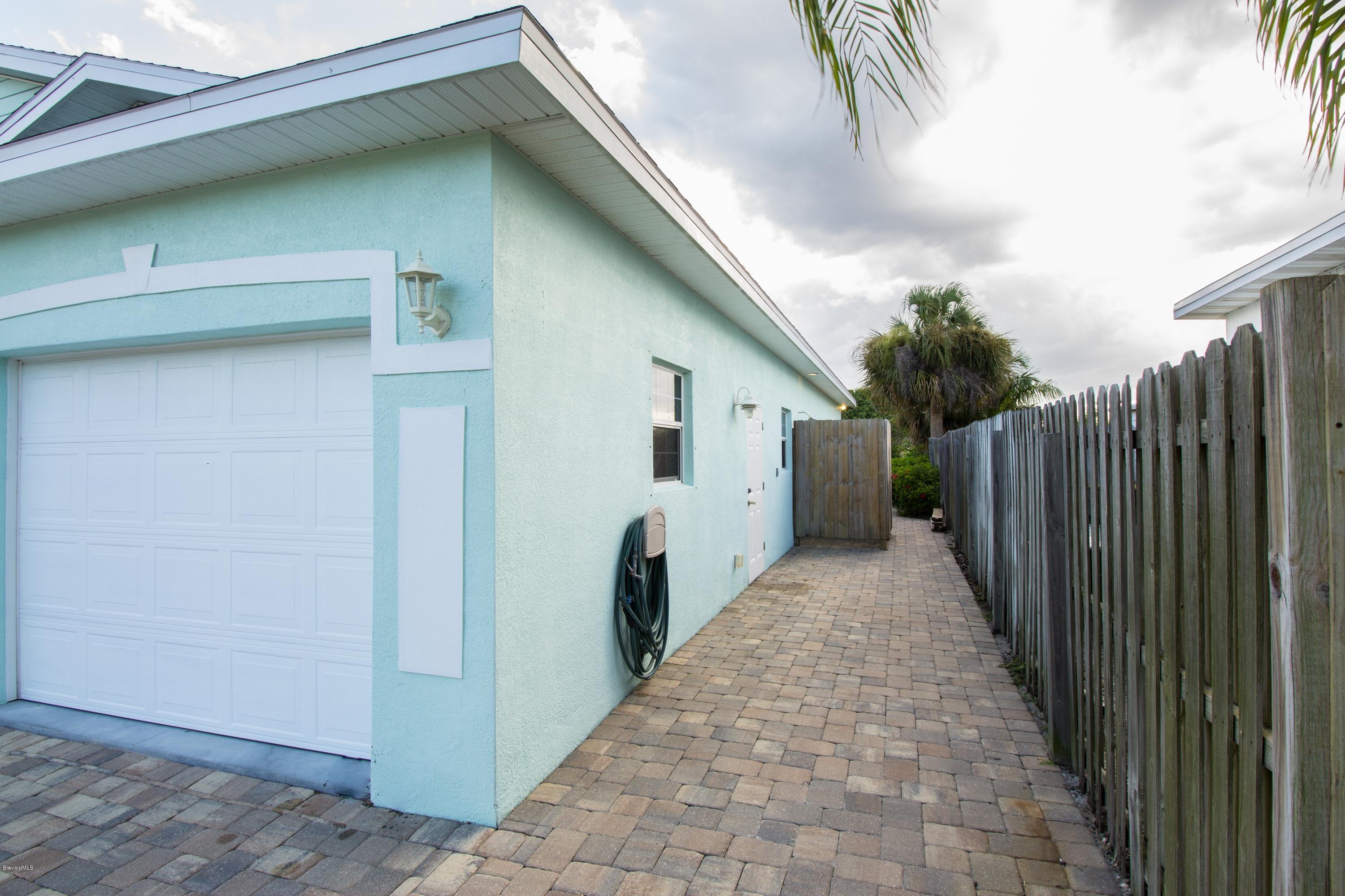 114 Aucila Road Cocoa Beach, FL 32931 - Photo 25 of 34 PAVERS ALL AROUND!