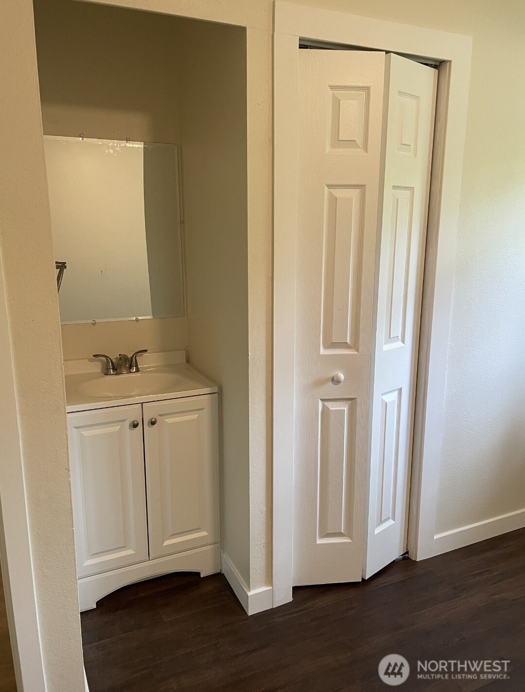 102 Garden Hill Road West Elma, WA 98541 - Photo 13 of 16 a view of storage and utility room with wooden floor
