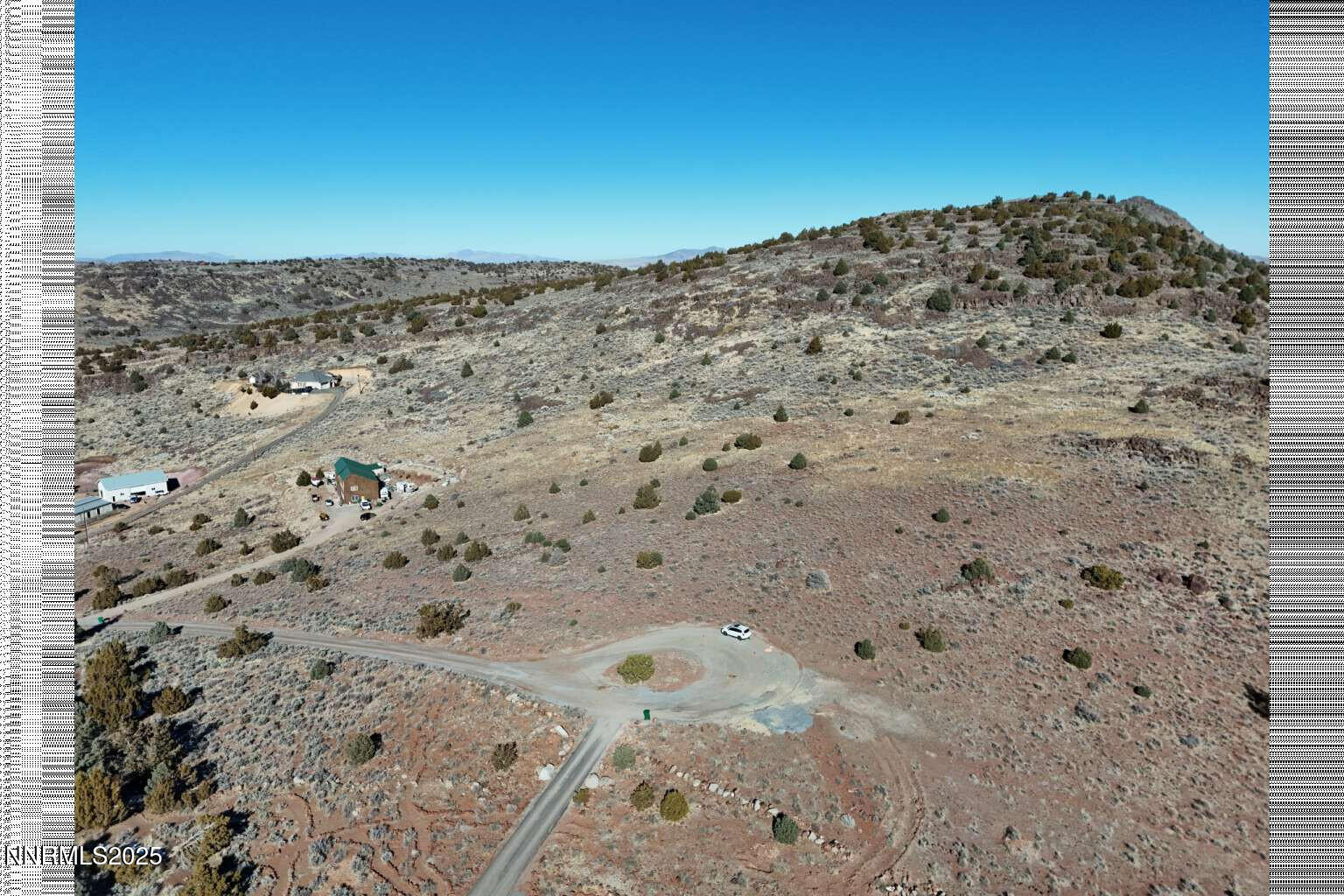 3180 Cartwright Road Reno, NV 89521 - Photo 9 of 19 a view of a dry yard with wooden fence