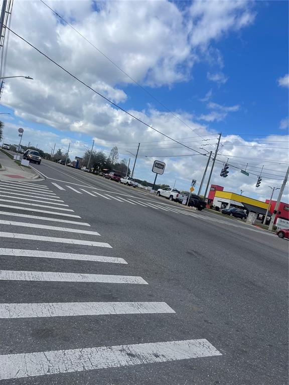 4412 Silver Star Road Orlando, FL 32808 - Photo 4 of 4 a view of a city street both side of street