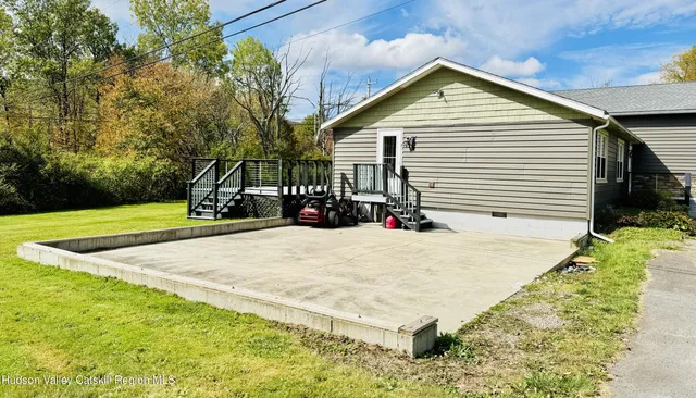 a house view with a garden space