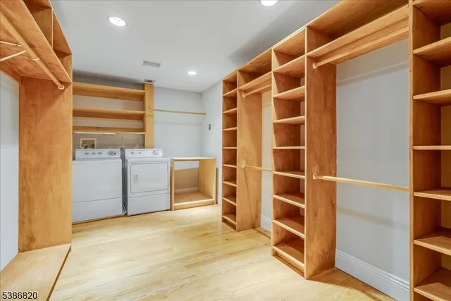 a view of an empty room with empty shelves