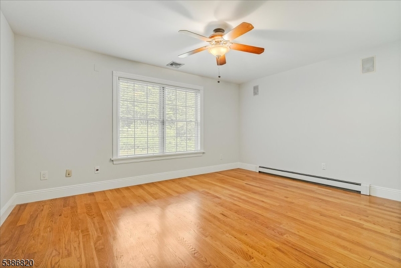 47 Stonehedge Drive Stockholm, NJ 07460 - Photo 25 of 36 a view of an empty room with a window
