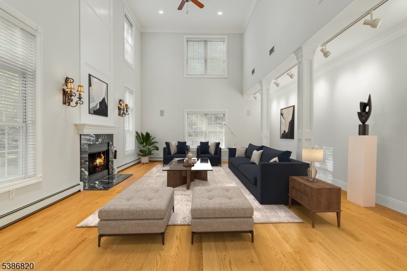 47 Stonehedge Drive Stockholm, NJ 07460 - Photo 3 of 36 a living room with furniture and a fireplace