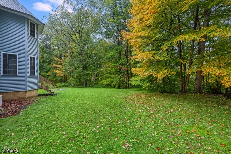 47 Stonehedge Drive Stockholm, NJ 07460 - Photo 32 of 36 a view of a yard with a trees