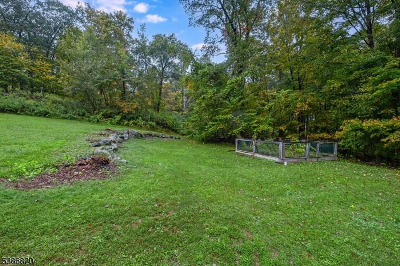 47 Stonehedge Drive Stockholm, NJ 07460 - Photo 33 of 36 a view of a backyard with a garden