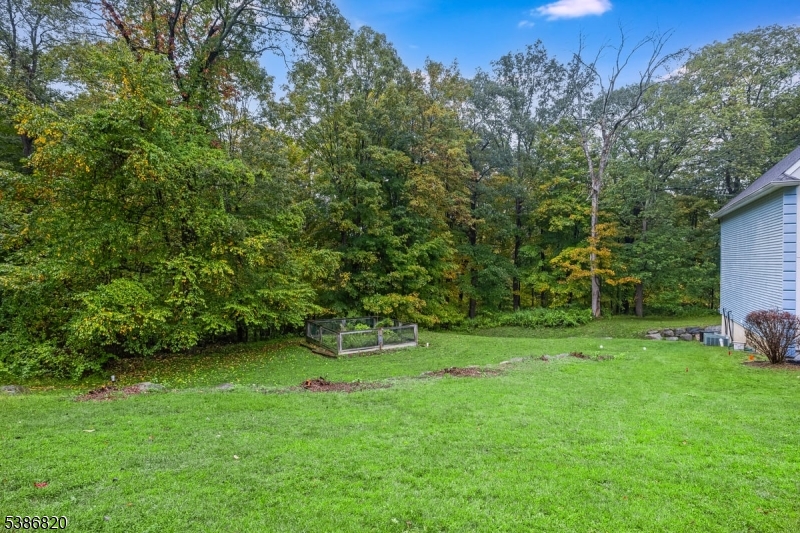 47 Stonehedge Drive Stockholm, NJ 07460 - Photo 34 of 36 a green field with lots of trees in it