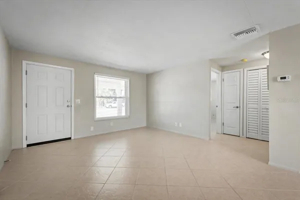 an empty room with windows