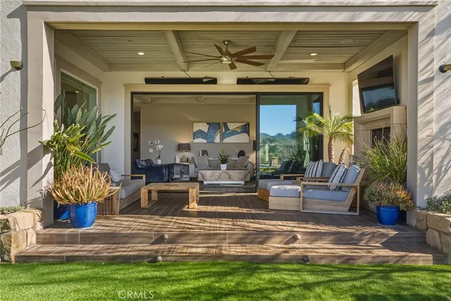 a spacious bedroom with a large bed and a couch