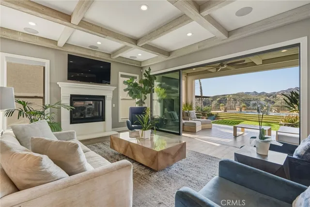 a kitchen with cabinets and chairs