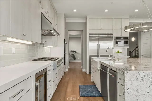a view of interior space with wooden floor and plants