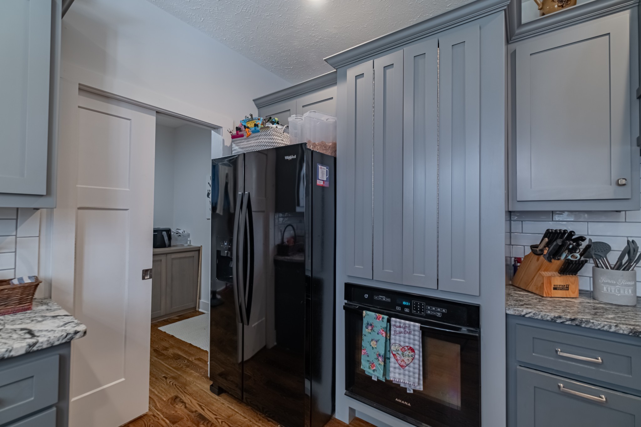 362 Lakeview Street Manchester, TN 37355 - Photo 11 of 39 a kitchen with stainless steel appliances granite countertop a refrigerator and a stove top oven