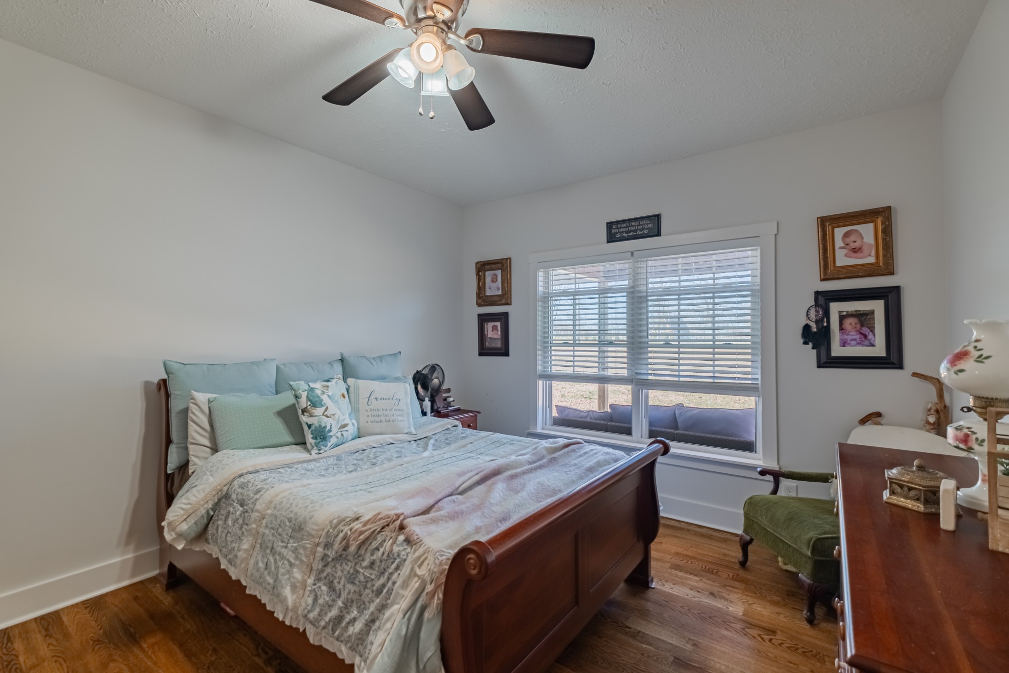 362 Lakeview Street Manchester, TN 37355 - Photo 13 of 39 a bedroom with a bed and a chandelier