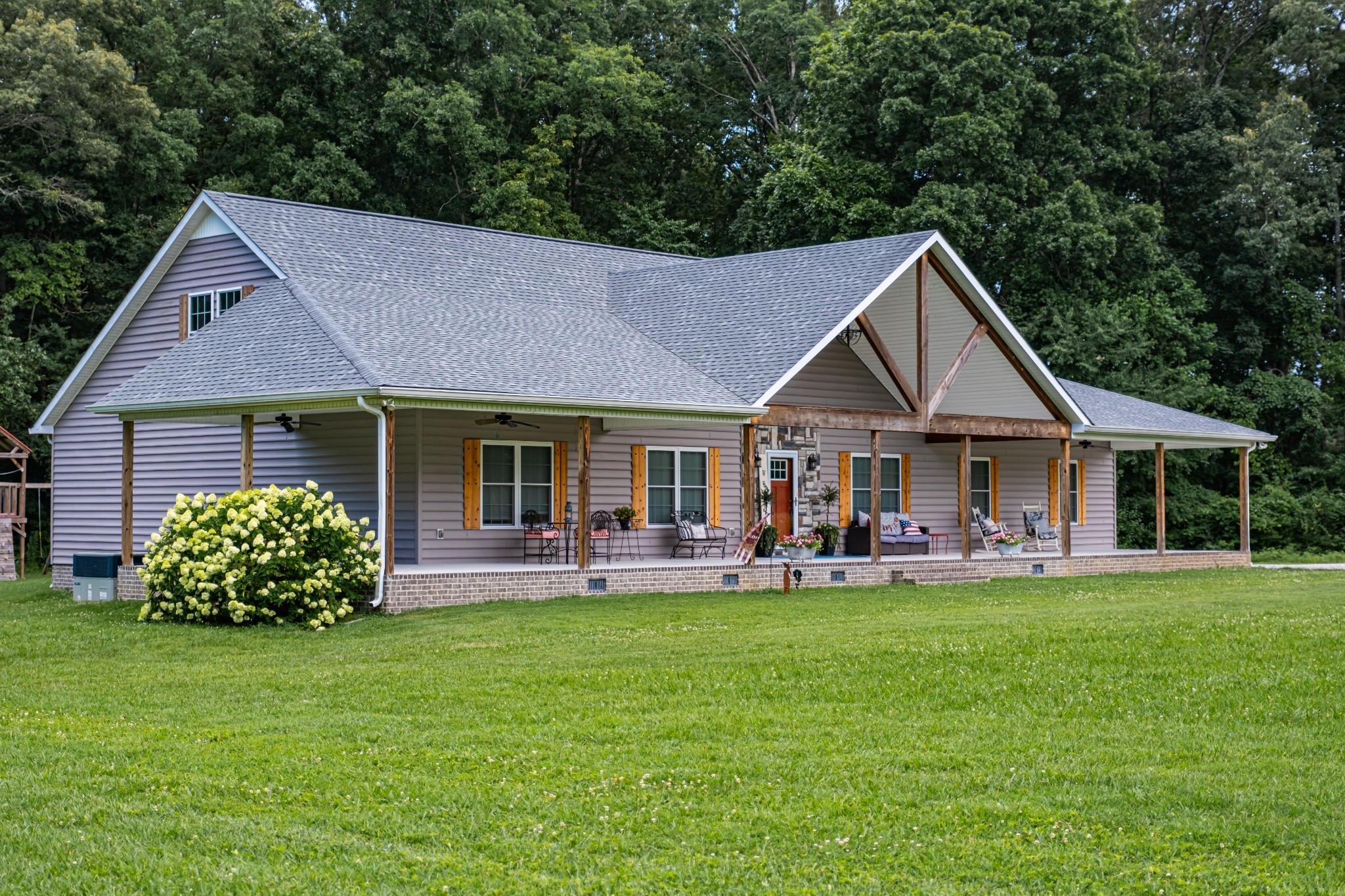 362 Lakeview Street Manchester, TN 37355 - Photo 2 of 39 a front view of a house with garden and porch