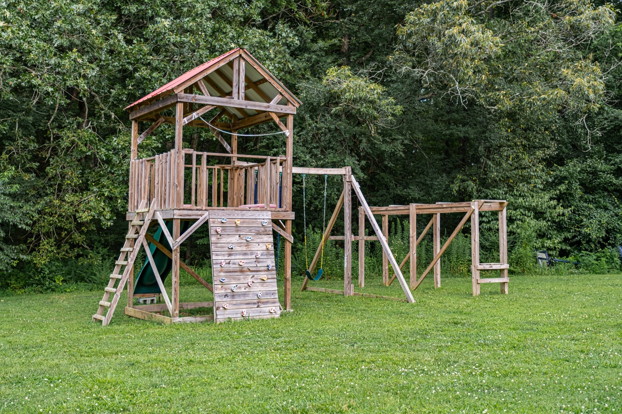 362 Lakeview Street Manchester, TN 37355 - Photo 34 of 39 a view of a house with a big yard and a child swing
