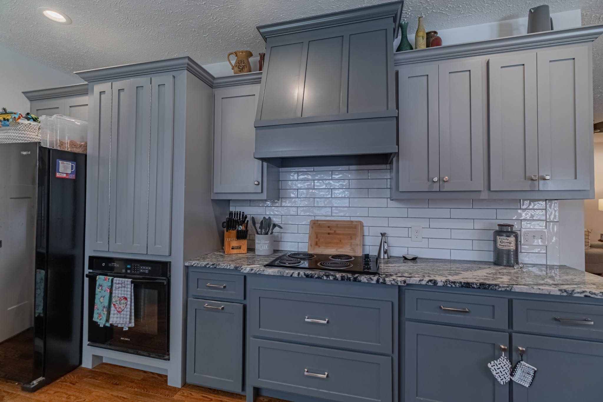 362 Lakeview Street Manchester, TN 37355 - Photo 9 of 39 a kitchen with stainless steel appliances granite countertop a refrigerator and a stove top oven