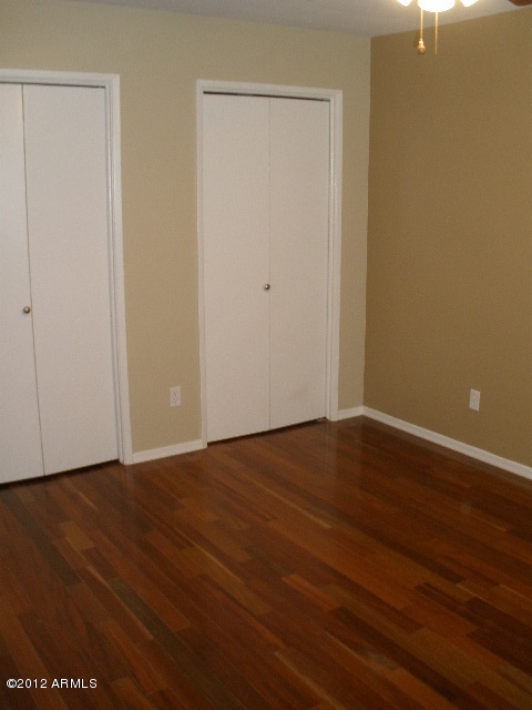 2301 East Greenway Road Phoenix, AZ 85022 - Photo 12 of 22 Master bedroom double closet and floor