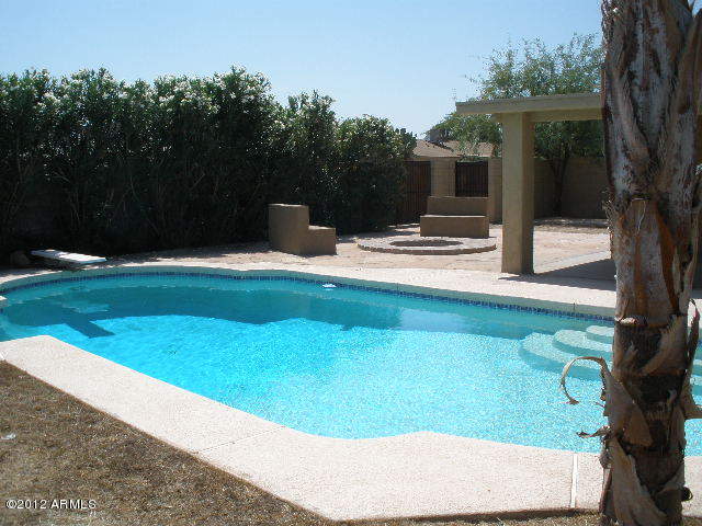 2301 East Greenway Road Phoenix, AZ 85022 - Photo 18 of 22 Pool and fire pit