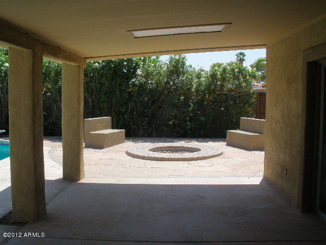 2301 East Greenway Road Phoenix, AZ 85022 - Photo 22 of 22 Covered Patio with fire pit and benches