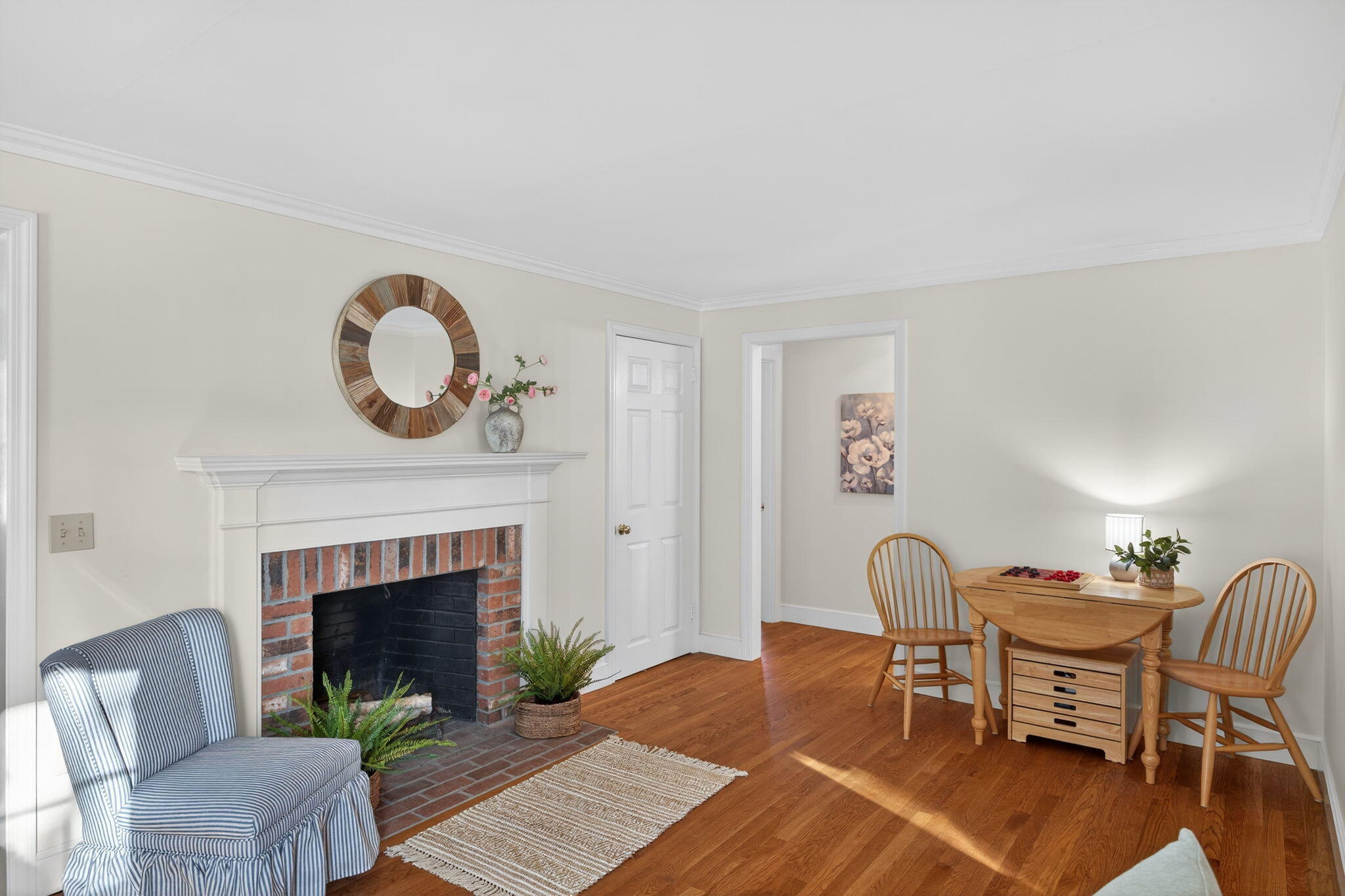 54 Marthas Lane Harwich, MA 02645 - Photo 15 of 53 a living room with furniture a fireplace and a fireplace