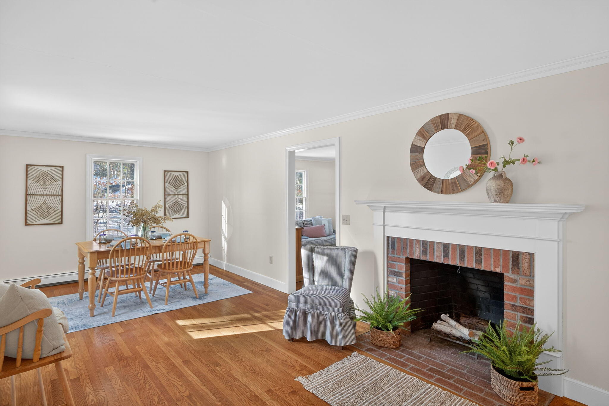 54 Marthas Lane Harwich, MA 02645 - Photo 16 of 53 a living room with furniture and a fireplace