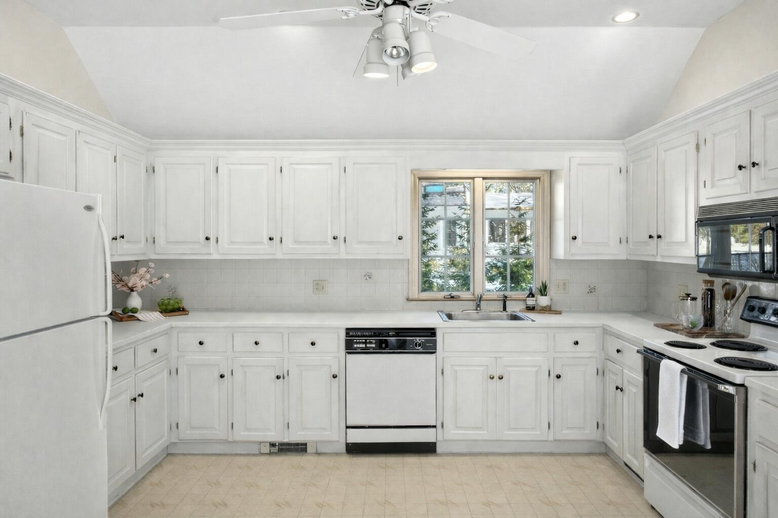 54 Marthas Lane Harwich, MA 02645 - Photo 18 of 53 a kitchen with white cabinets and white appliances