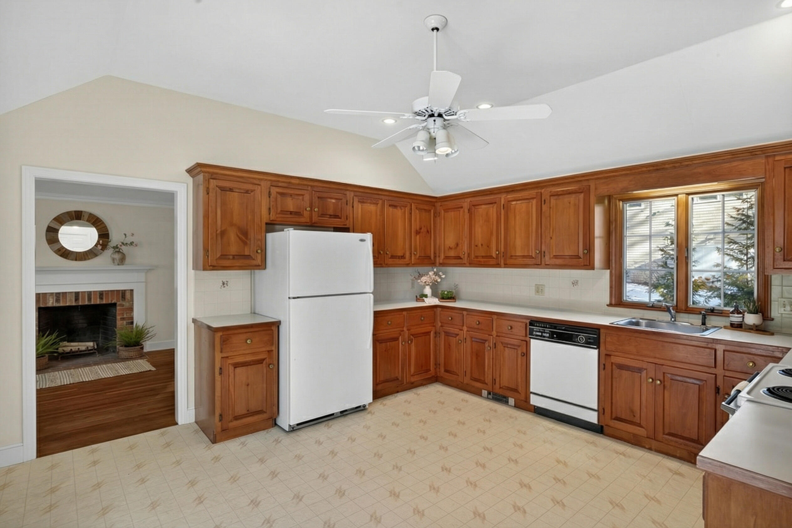 54 Marthas Lane Harwich, MA 02645 - Photo 20 of 53 a kitchen with a refrigerator and a sink
