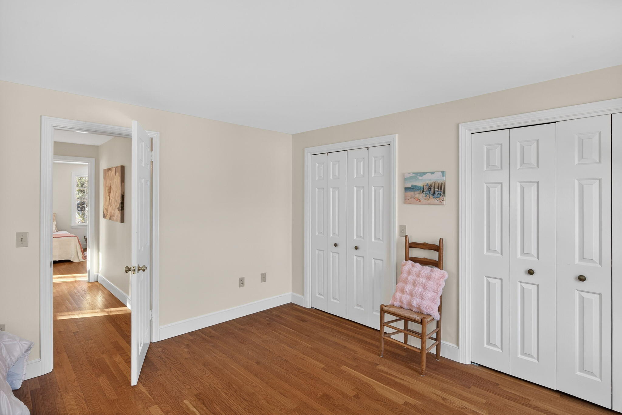54 Marthas Lane Harwich, MA 02645 - Photo 33 of 53 a view of a room with wooden floor cabinet and front door