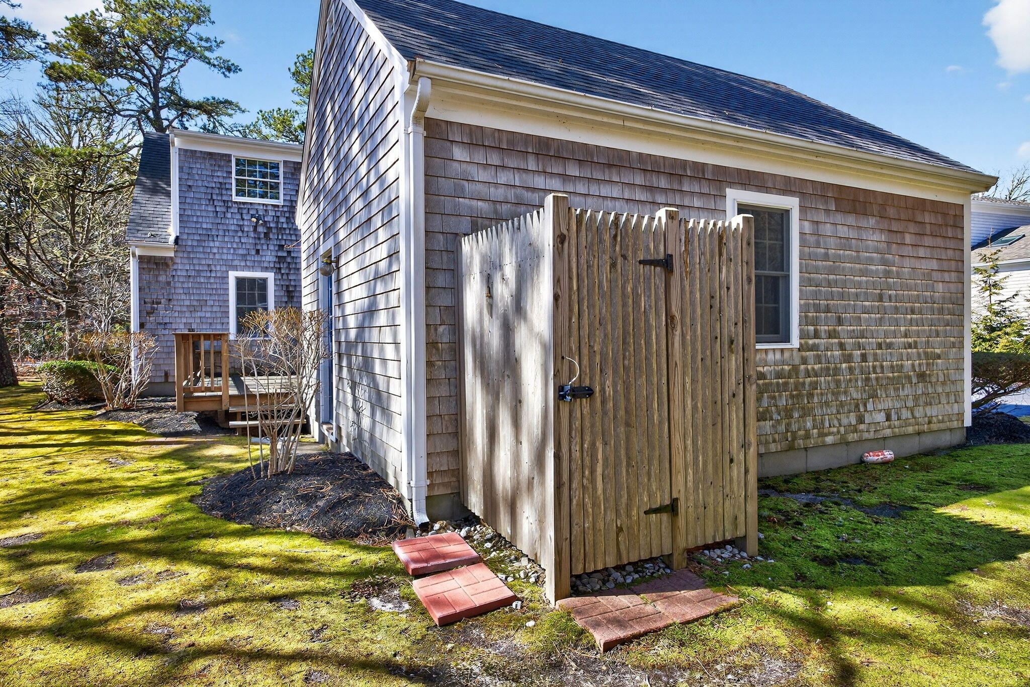54 Marthas Lane Harwich, MA 02645 - Photo 49 of 53 a view of backyard with barbeque grill and plants