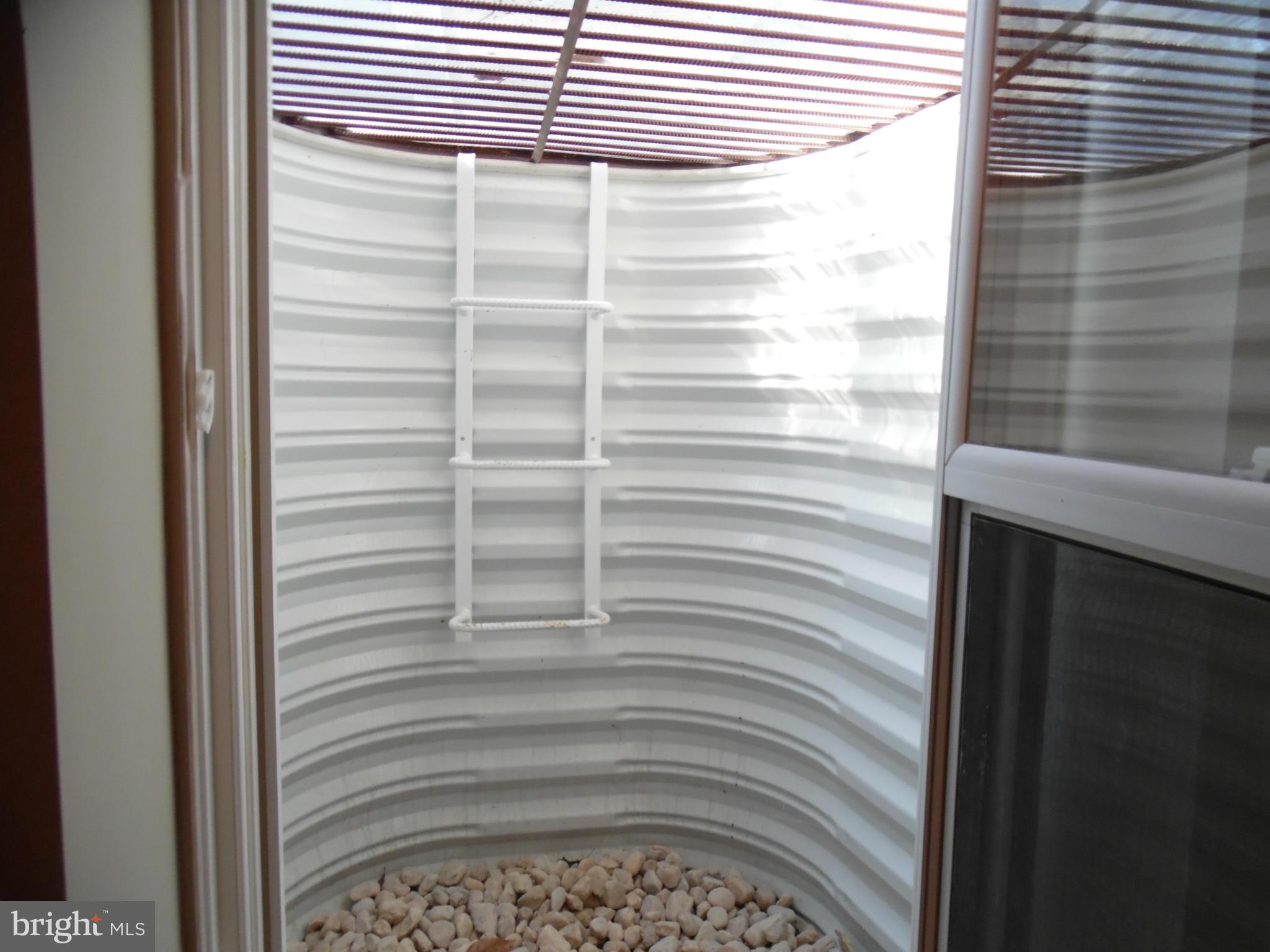 8804 Shadowlake Way Springfield, VA 22153 - Photo 23 of 23 Basement Window Well Fire Egress