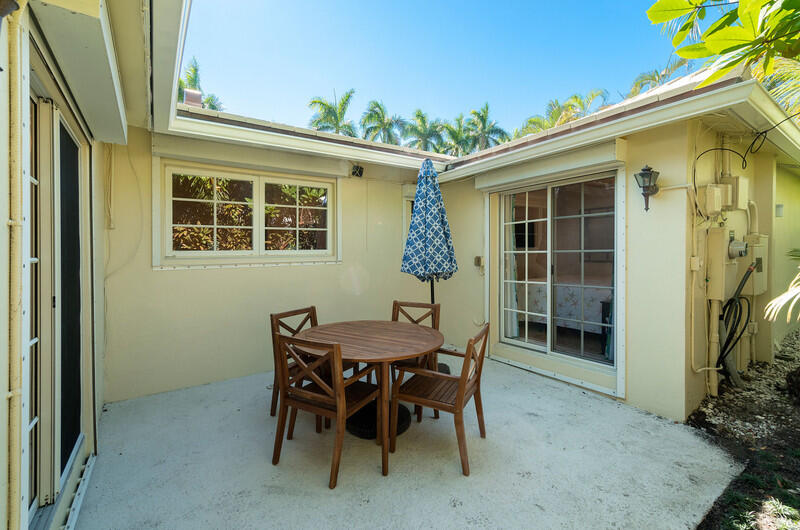 241 List Road Palm Beach, FL 33480 - Photo 23 of 62 Tranquil Patio Dining