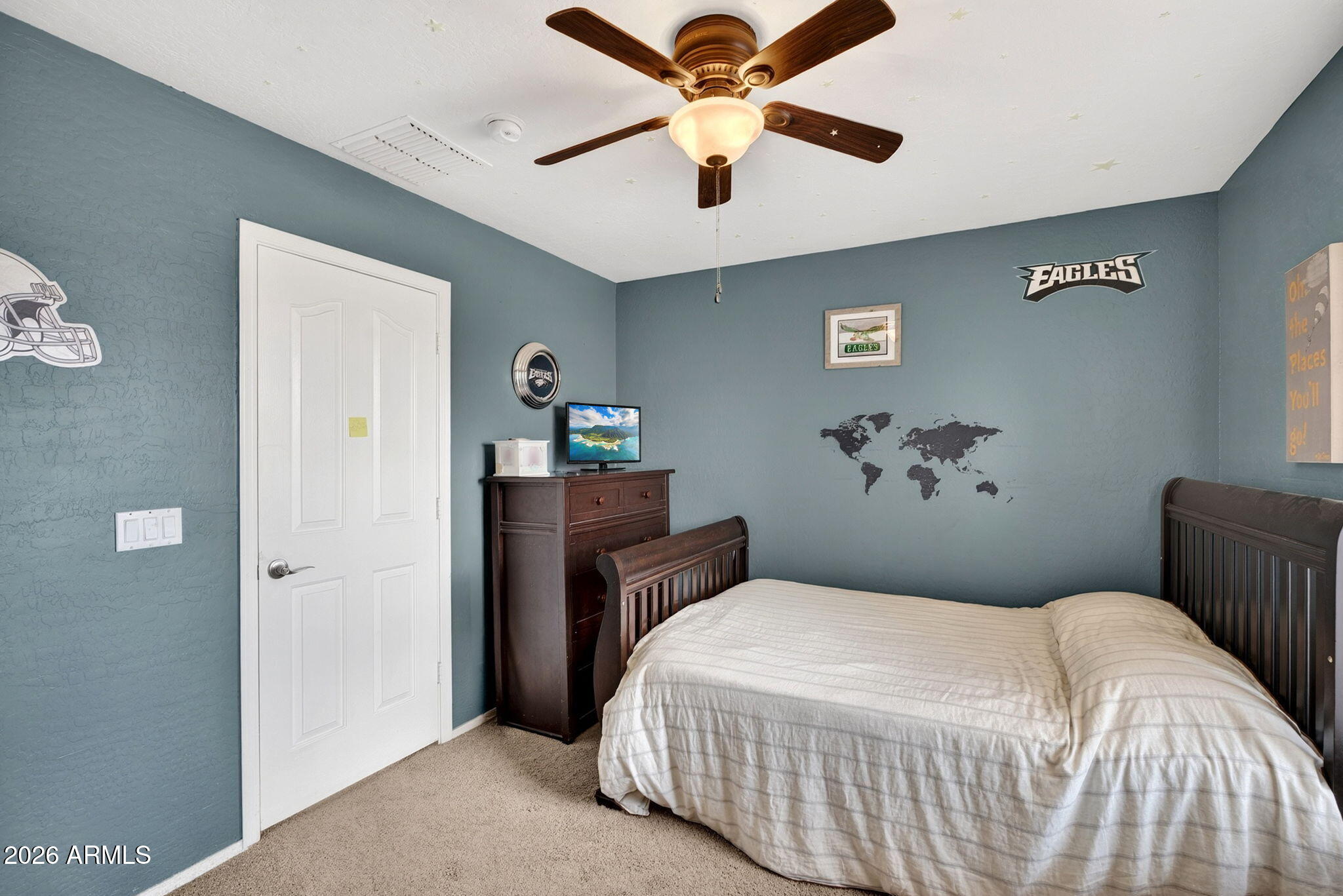 6280 South Sinova Court Gilbert, AZ 85298 - Photo 43 of 64 a bedroom with a bed and a chandelier