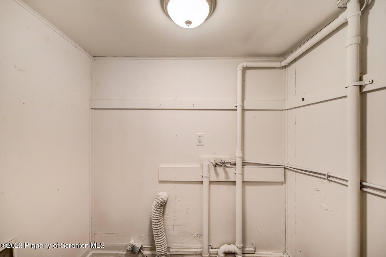 915 Ridge Avenue Scranton, PA 18510 - Photo 14 of 39 a bathroom with a shower