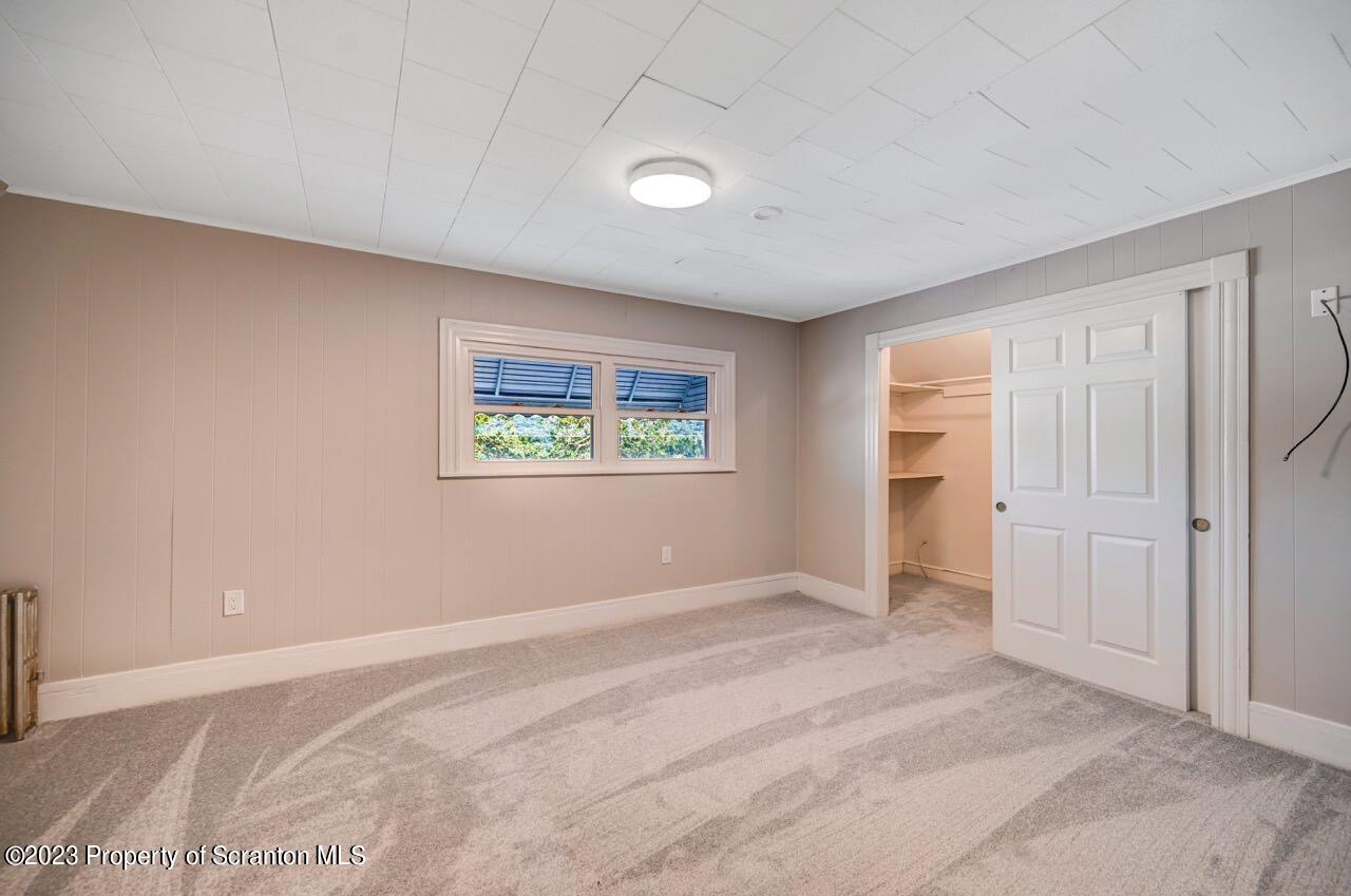 915 Ridge Avenue Scranton, PA 18510 - Photo 17 of 39 a view of an empty room with a window