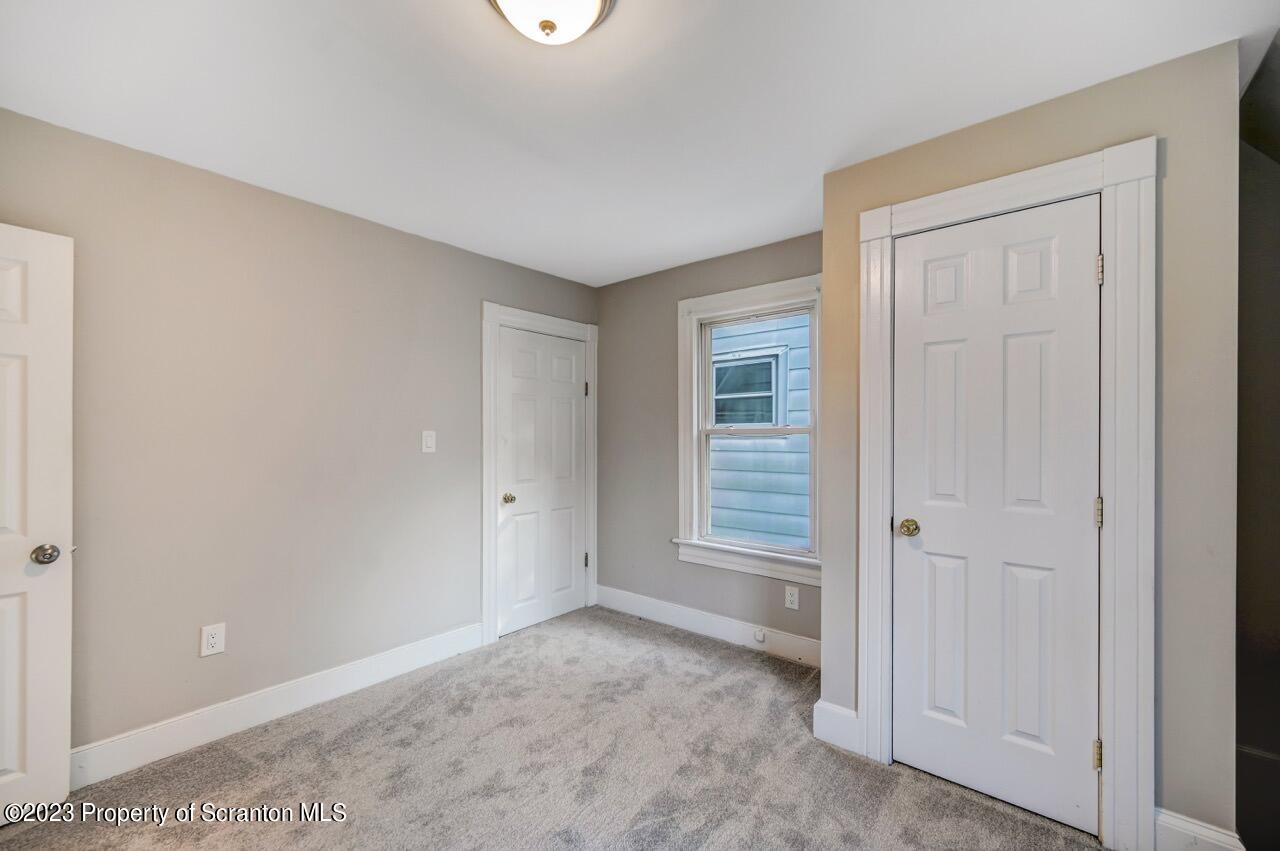 915 Ridge Avenue Scranton, PA 18510 - Photo 29 of 39 an empty room with windows