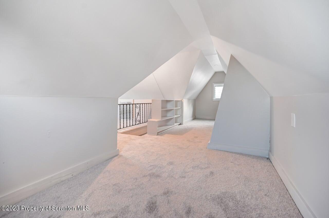 915 Ridge Avenue Scranton, PA 18510 - Photo 33 of 39 a view of a big room with closet and windows