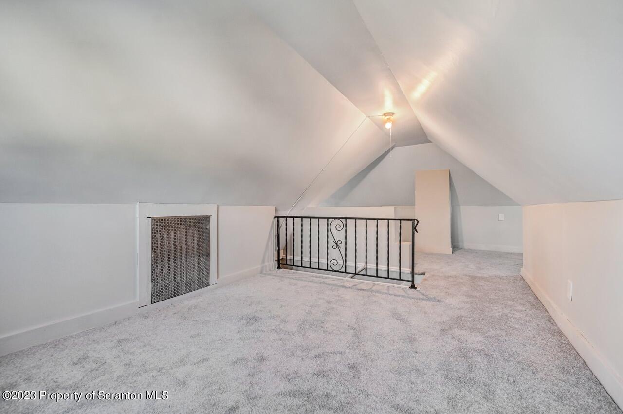 915 Ridge Avenue Scranton, PA 18510 - Photo 35 of 39 a view of a livingroom with a staircase