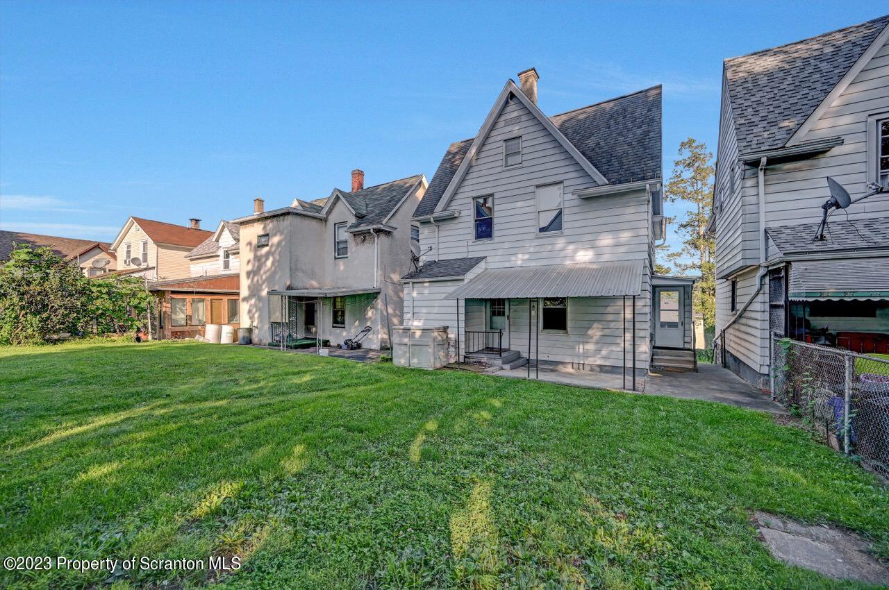 915 Ridge Avenue Scranton, PA 18510 - Photo 39 of 39 a front view of a house with garden