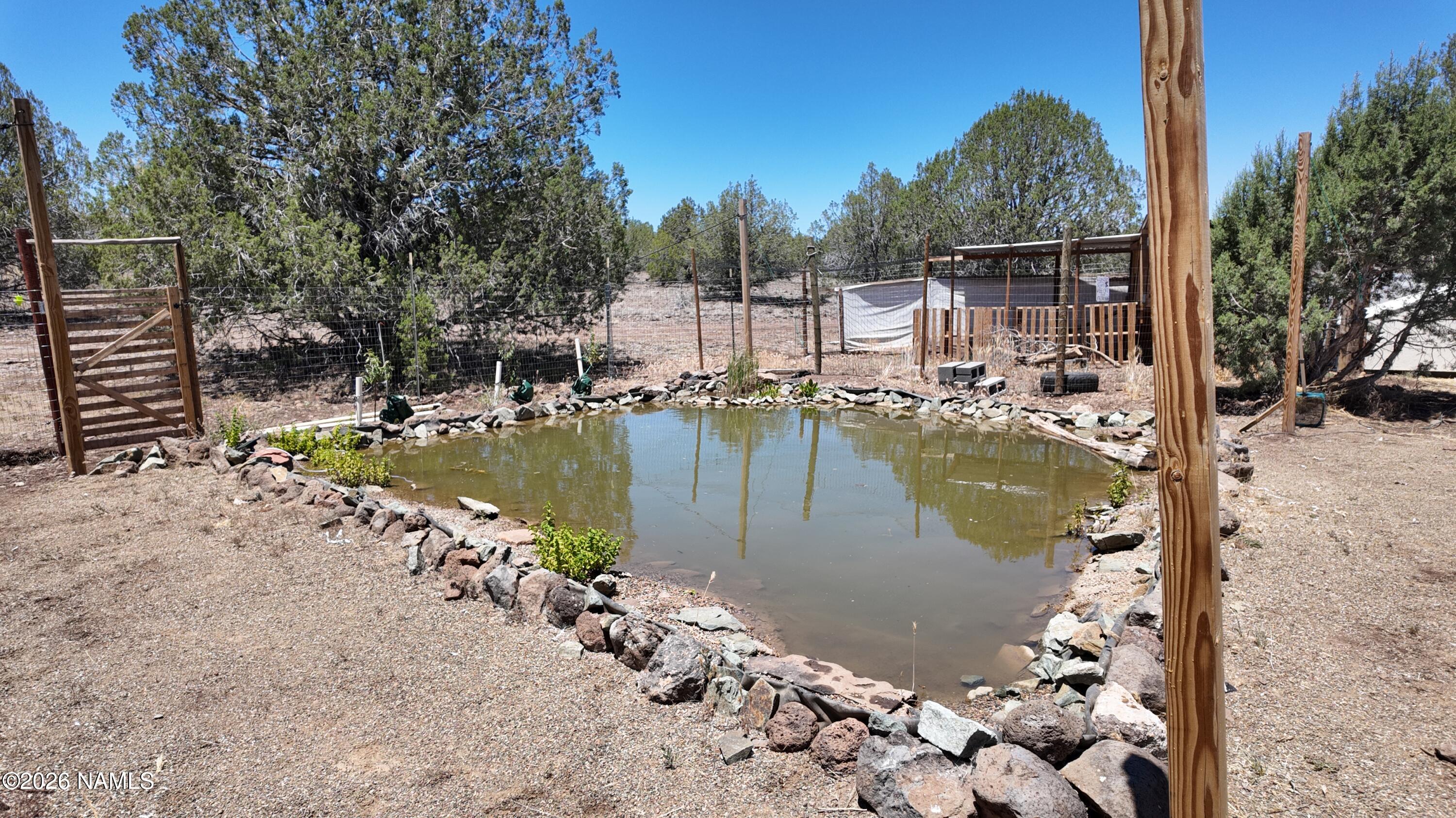 4190 North Ten Tanks Road Williams, AZ 86046 - Photo 22 of 45 Pond with bog filtration