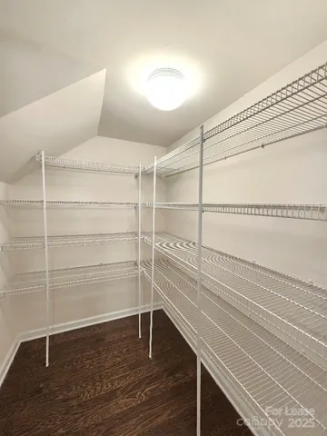 a view of an empty walk in closet