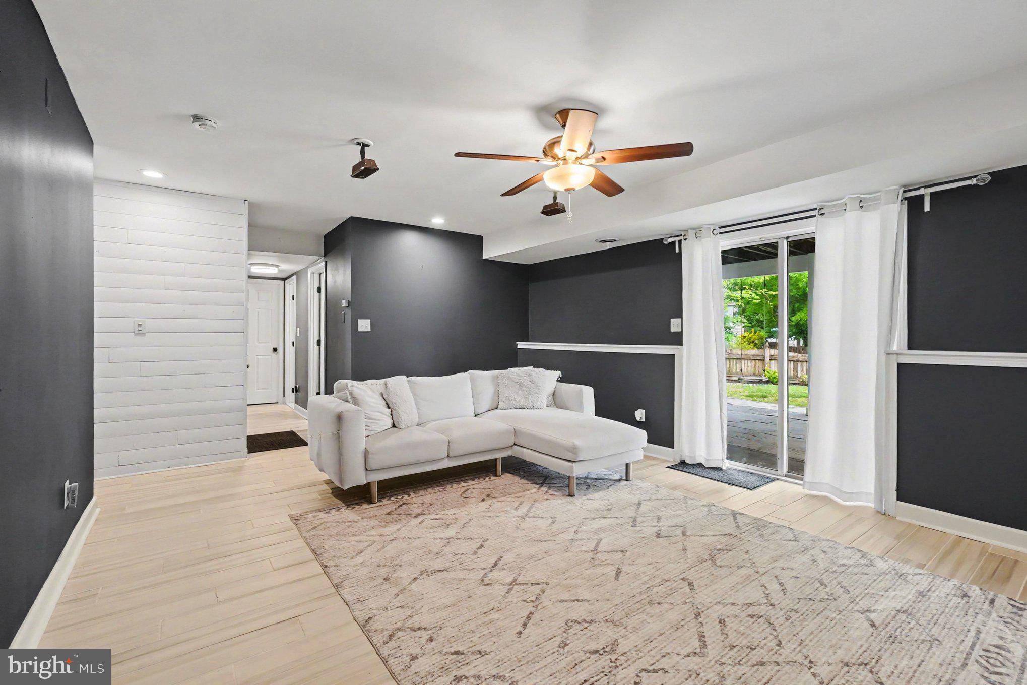 3727 Seneca Garden Road Middle River, MD 21220 - Photo 19 of 44 Family Room with surround sound and patio doors